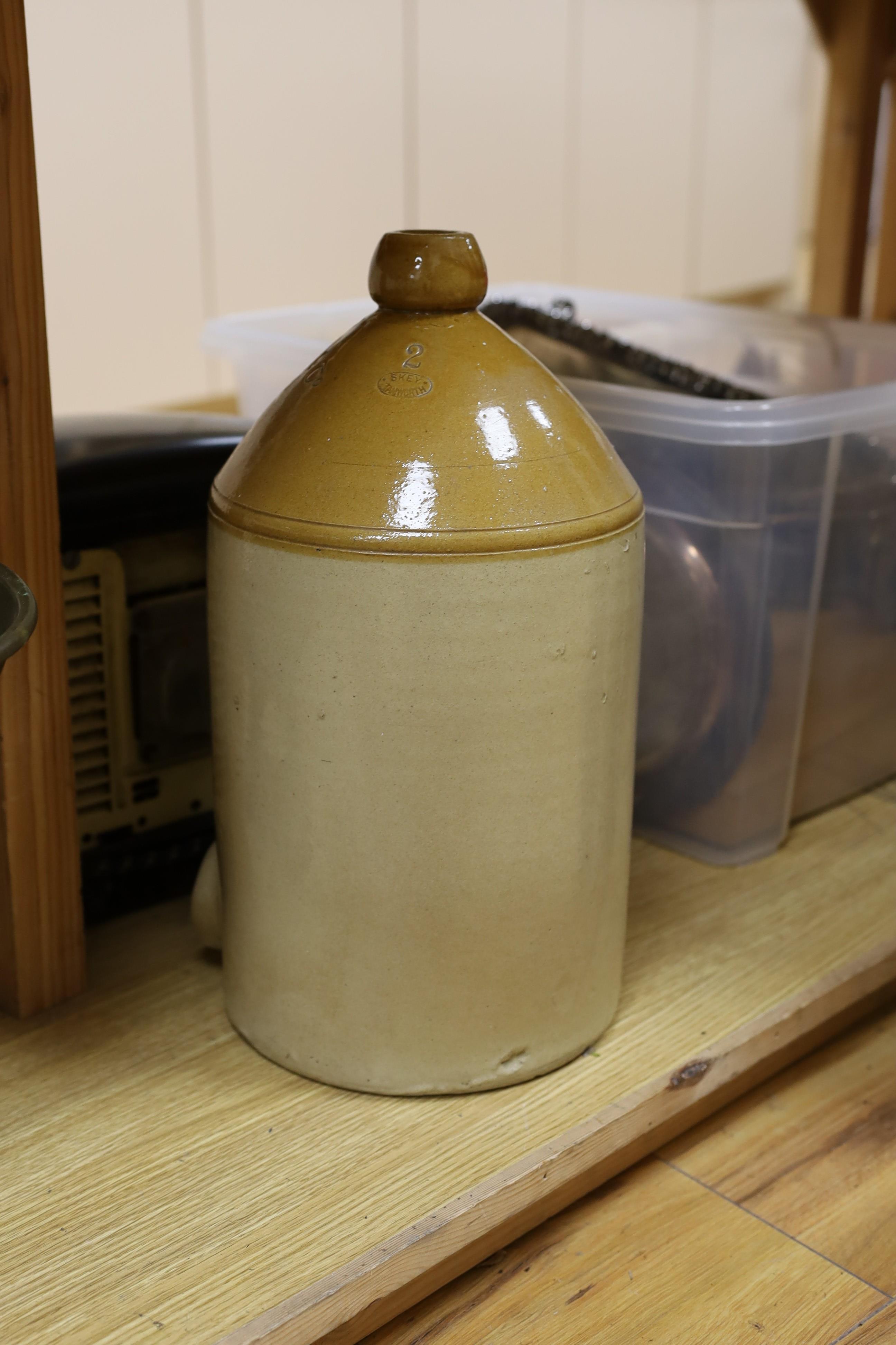 A 1930's HMV bakelite electric heater, A Mattocks cast iron weighing scale and a Lewes stoneware jar